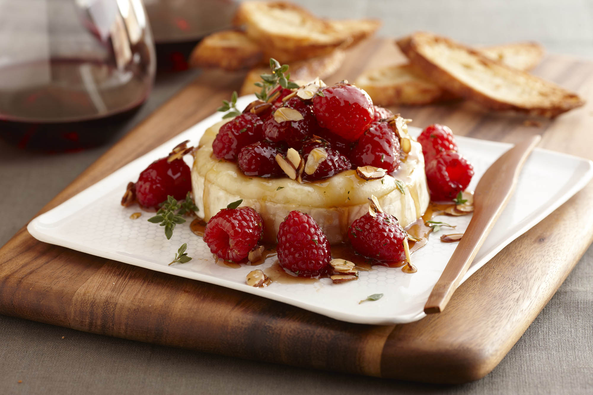 Warm Brie with Honeyed Raspberries and Almonds
