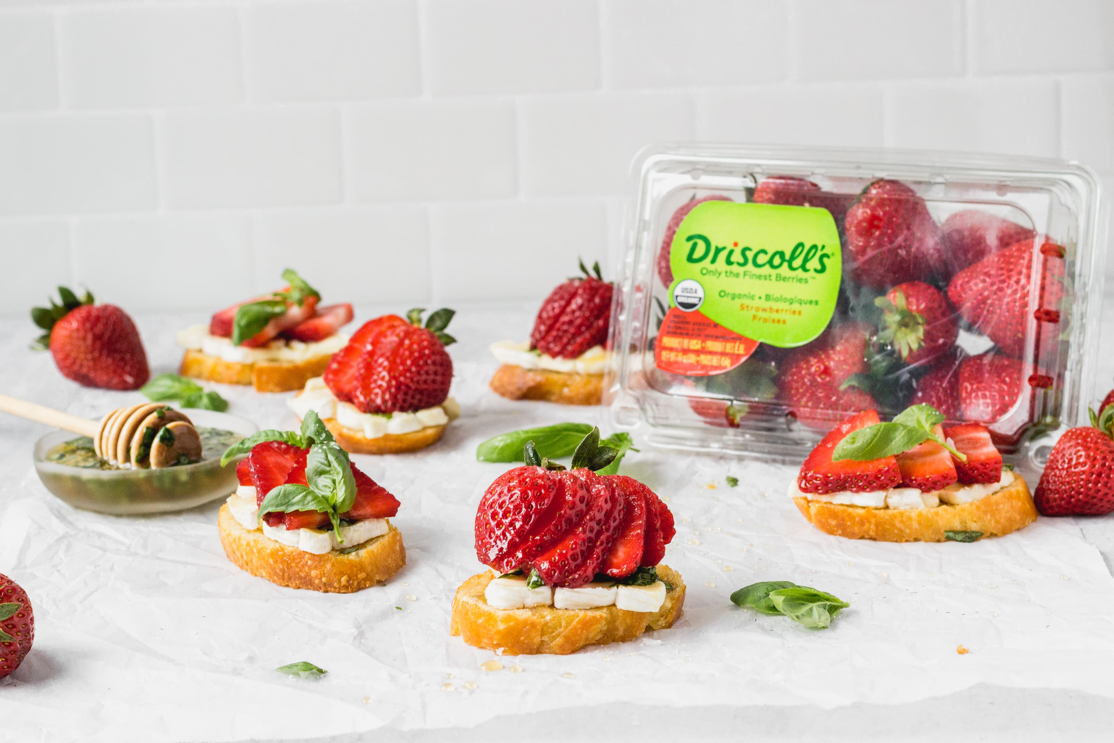 Brie Crostini with Driscoll's Strawberries and Basil Honey