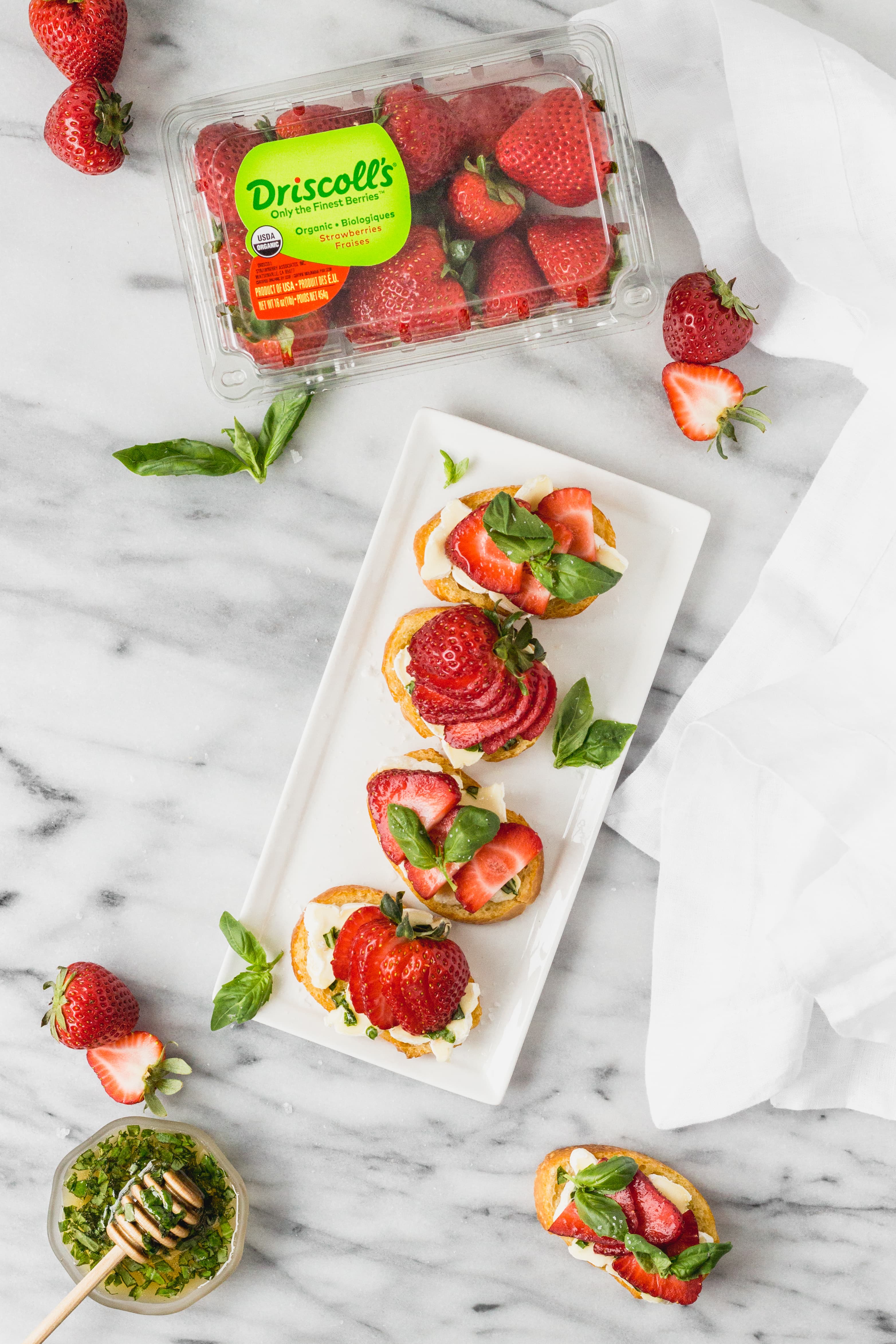 Brie Crostini with Driscoll's Strawberries and Basil Honey