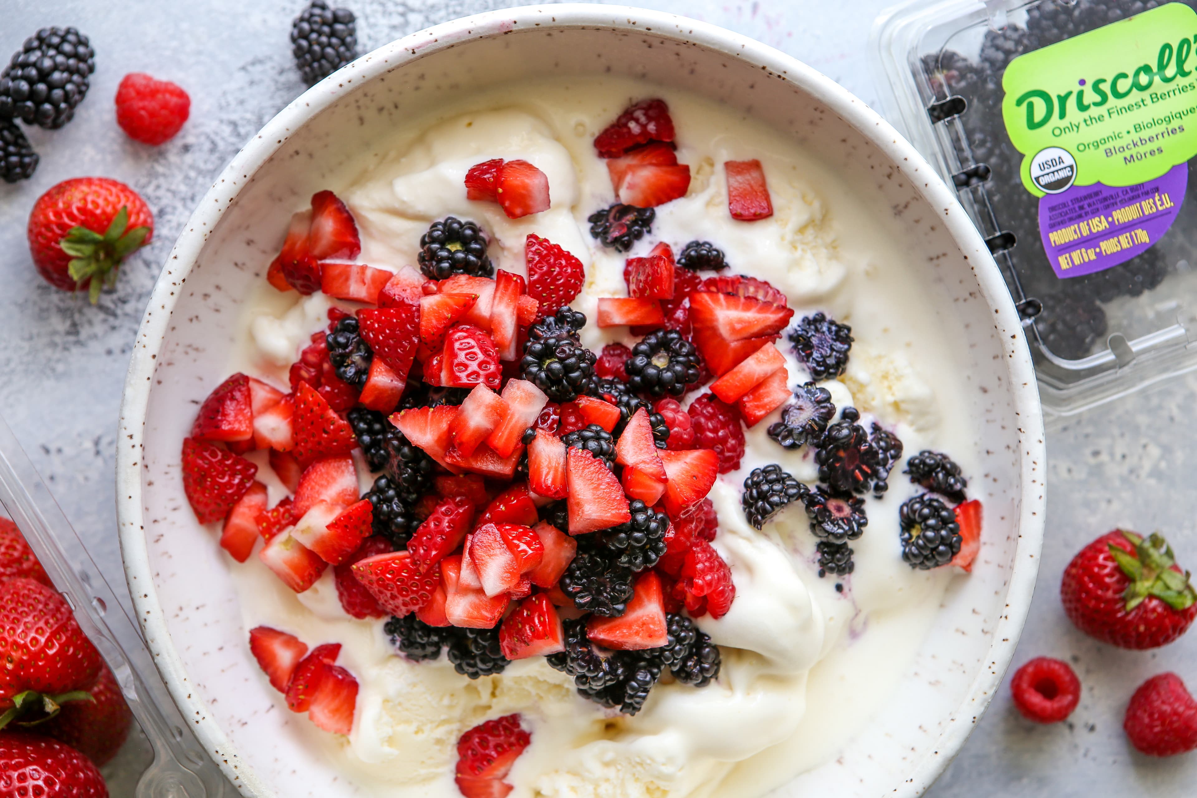 Mixed berry ice cream pie topped with blackberries and strawberries