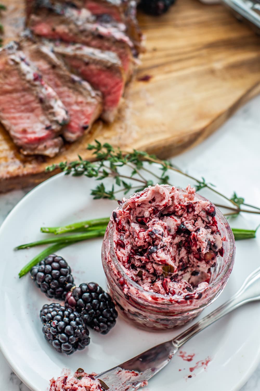 New York Strip Steak with Blackberry Herb Compound Butter