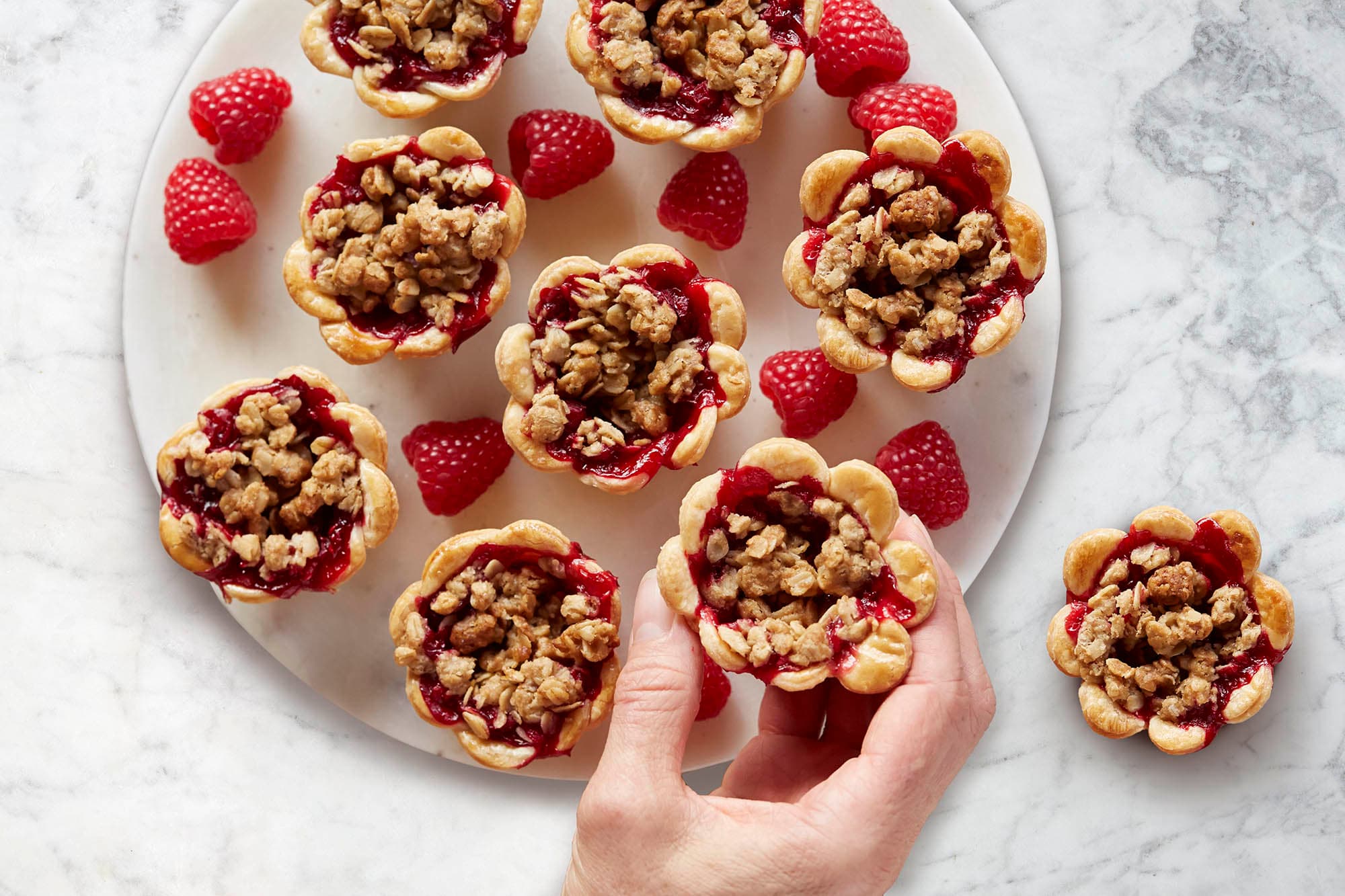 Mini raspberry cranberry crumb pies