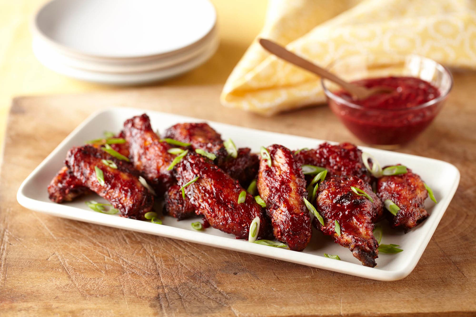 Plate of sweet and spicy raspberry chicken wings